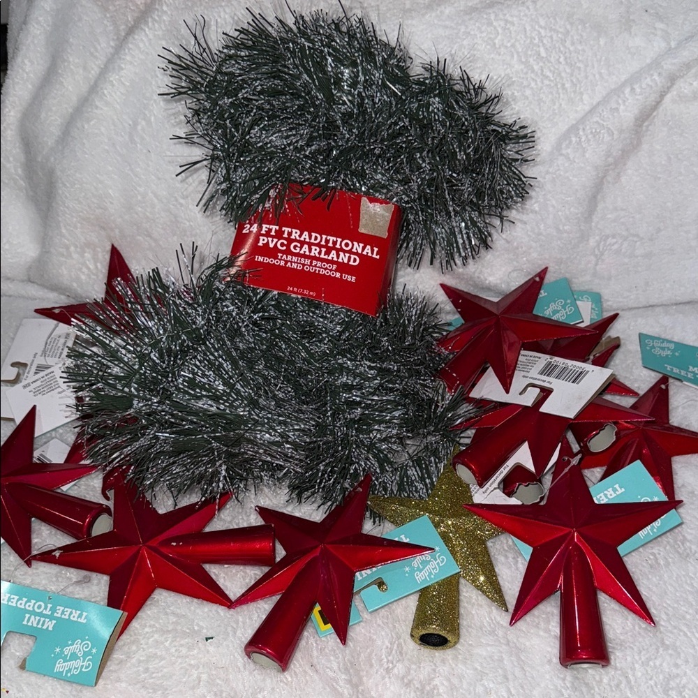 Festive Red and Gold Star Garland with Green Foliage